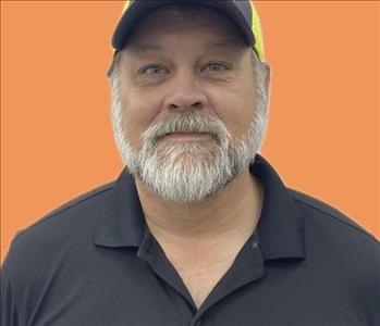 man in front of orange background